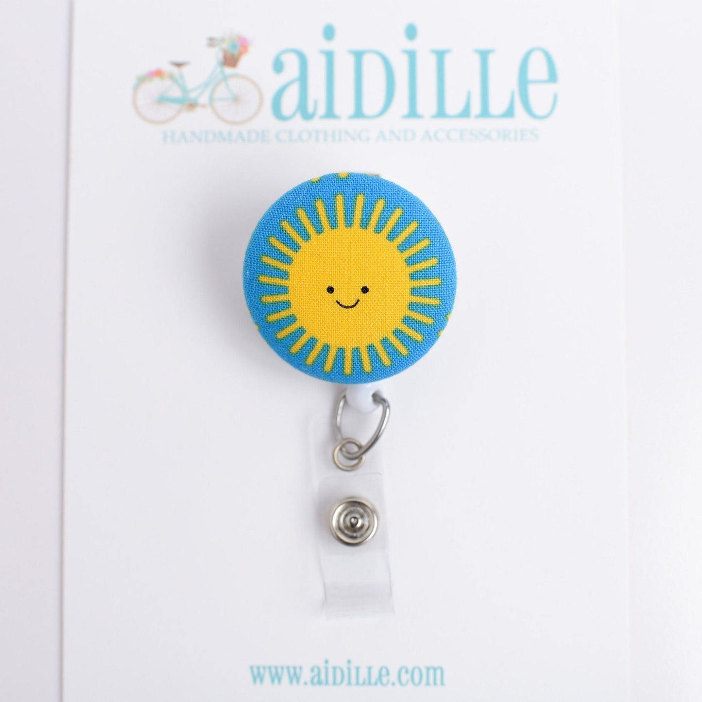Happy Sun Fabric Button Badge Reel